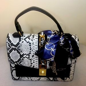 Aldo’s Snake Purse
